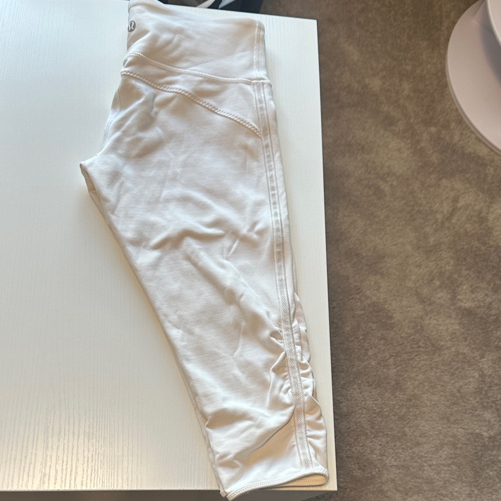 LuluLemon White Leggings with lace detail down both legs
